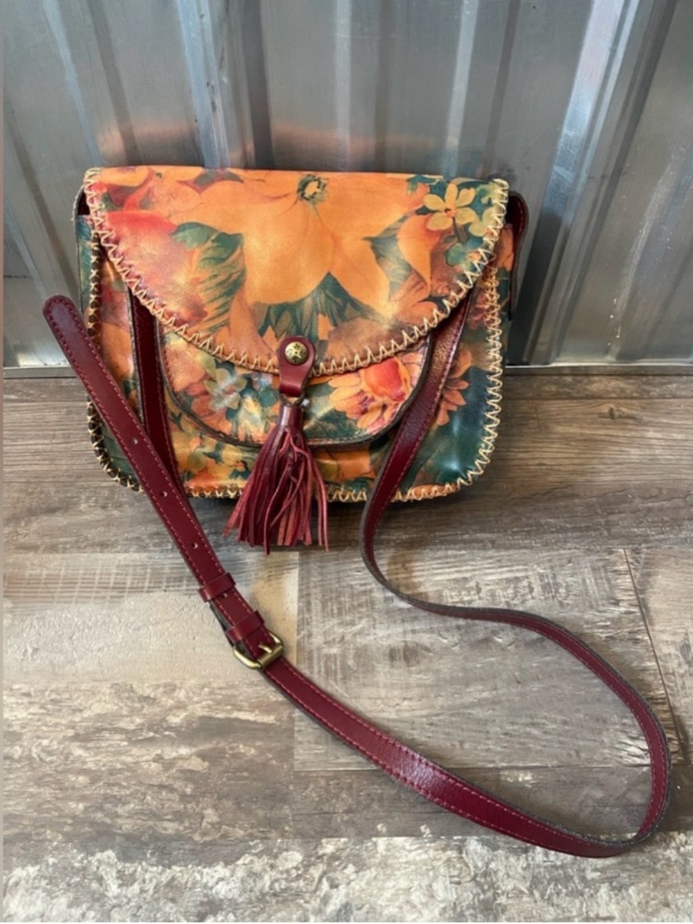 Patricia Nash leather floral crossbody bag in the Balluri 💯 leather tassel